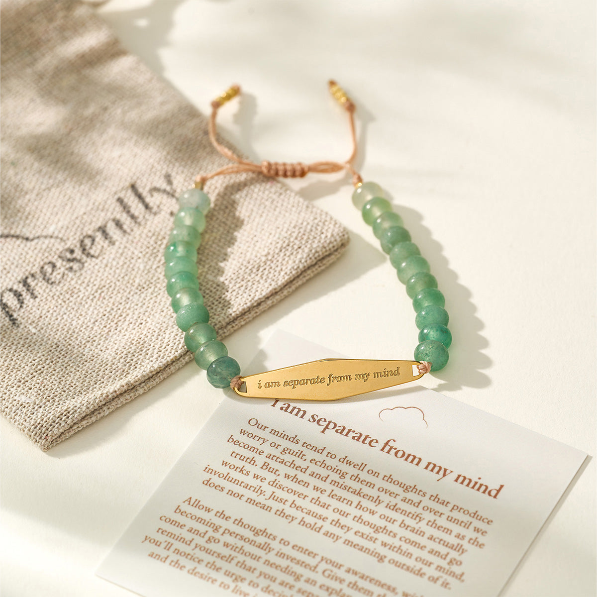 Aventurine gemstone bracelet with packaging and a card displaying the engraved phrase