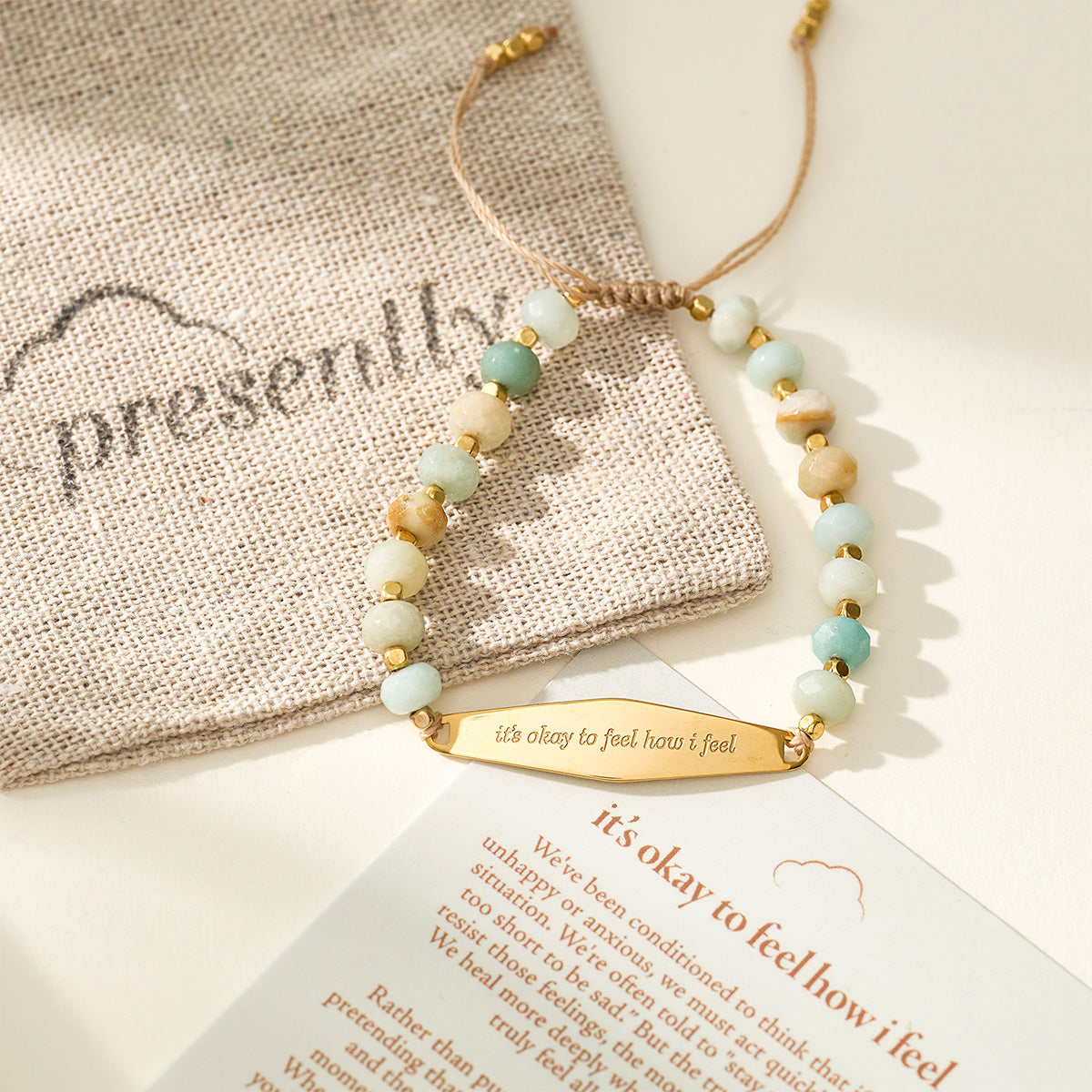 An agate beaded bracelet with gold accents, designed to inspire emotional acceptance and ease anxiety. The bracelet features gentle, muted agate stones paired with subtle gold beads, symbolizing self-kindness and the affirmation that it's okay to experience your emotions, offering both comfort and balance.