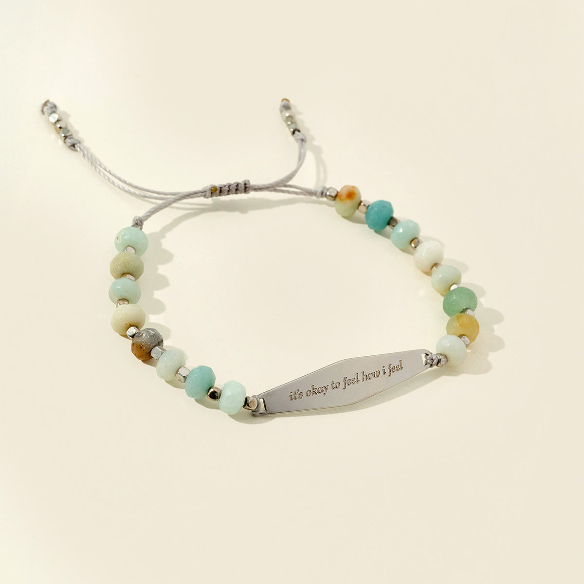 A stainless steel silver amazonite beaded bracelet, created to encourage emotional acceptance in managing anxiety. The bracelet features soothing, soft-toned agate beads, each symbolizing self-compassion and reminding you that it's okay to feel your emotions, bringing comfort and grounding.