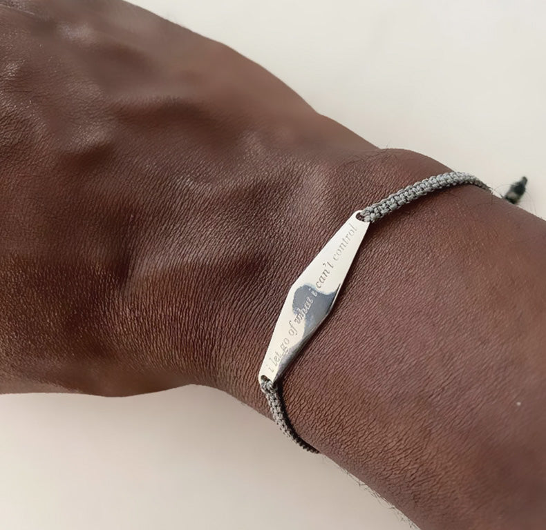 Customer wearing Charcoal Macrame Bracelet engraved with 