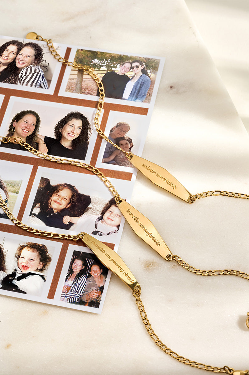 Presently bracelets arranged across a printed collage of childhood and adult photos of Lindsay and Emily, the founders. The images showcase their journey from childhood to adulthood, emphasizing the personal story behind Presently's mission to promote mental wellness through engraved messages.