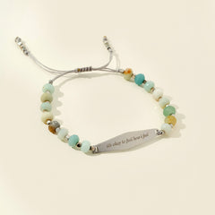 A stainless steel silver amazonite beaded bracelet, created to encourage emotional acceptance in managing anxiety. The bracelet features soothing, soft-toned agate beads, each symbolizing self-compassion and reminding you that it's okay to feel your emotions, bringing comfort and grounding.