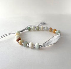 Silver Amazonite gemstone statement bracelet engraved with the phrase "My thoughts are passing clouds," designed to support mental wellness and encourage mindfulness.