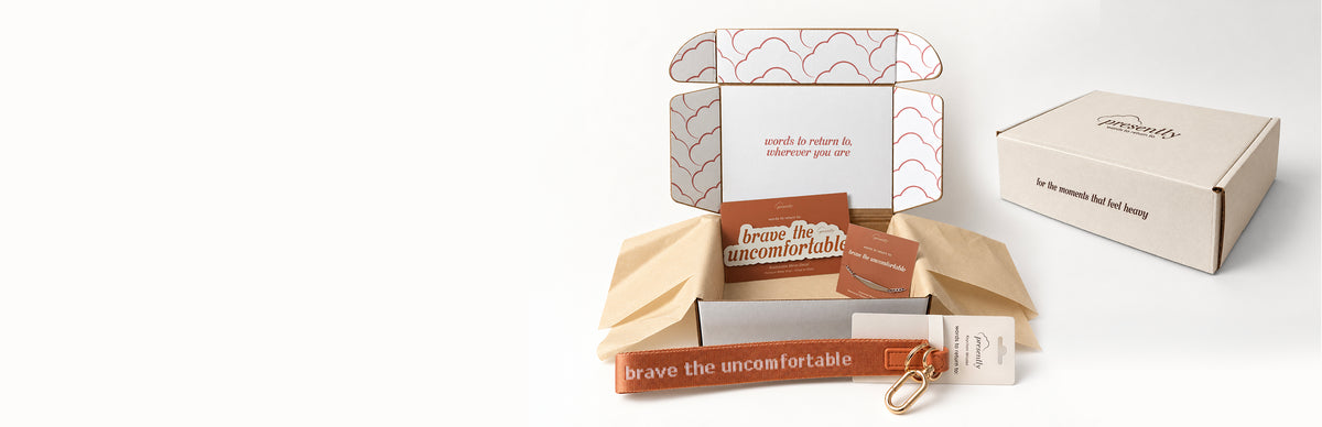 A branded gift box containing three items featuring a therapy-inspired reminder for people with anxiety and OCD.