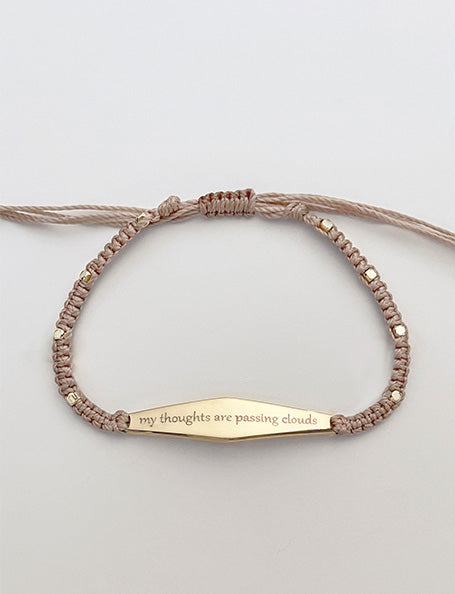 Gold Macrame Bracelet with the phrase 