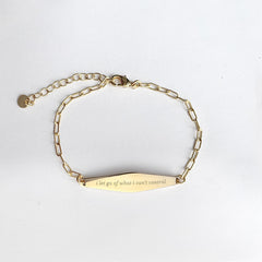 Gold Paper Clip Mindfulness Bracelet Engraved with the phrase "i let go of what i can't control"