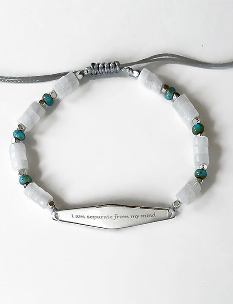 Silver Heishi Turquoise Bracelet with the phrase 