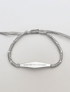Silver Macrame Bracelet with the phrase "brave the uncomfortable"