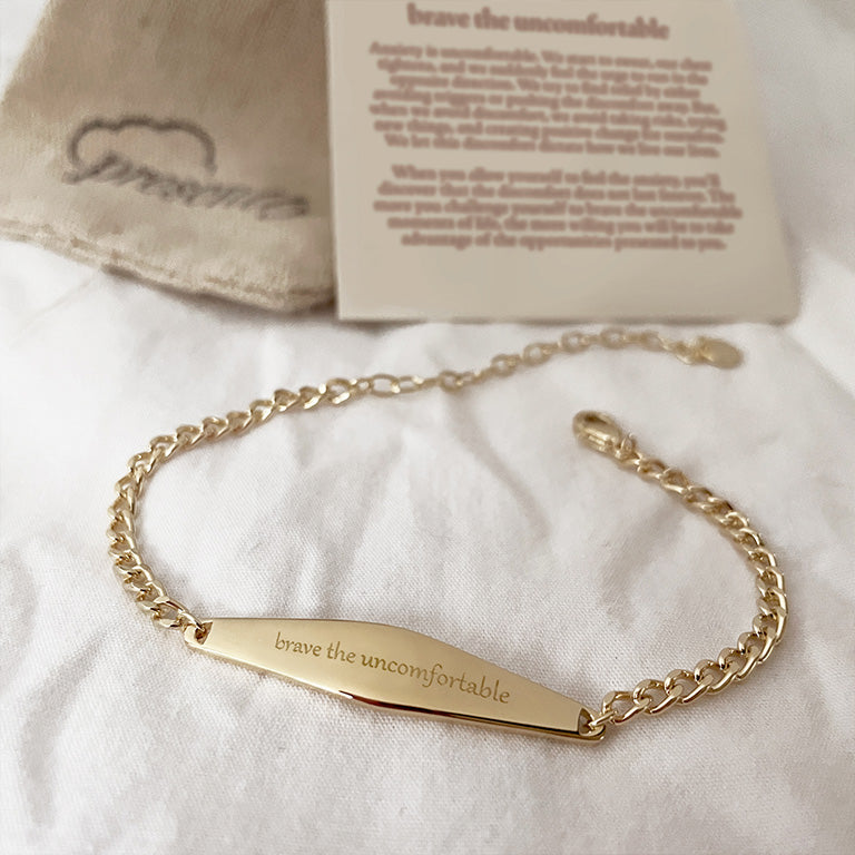 Gold Curb chain bracelet engraved with the phrase 