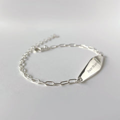 Silver Paper Clip Mindfulness Bracelet Engraved with the phrase "brave the uncomfortable"